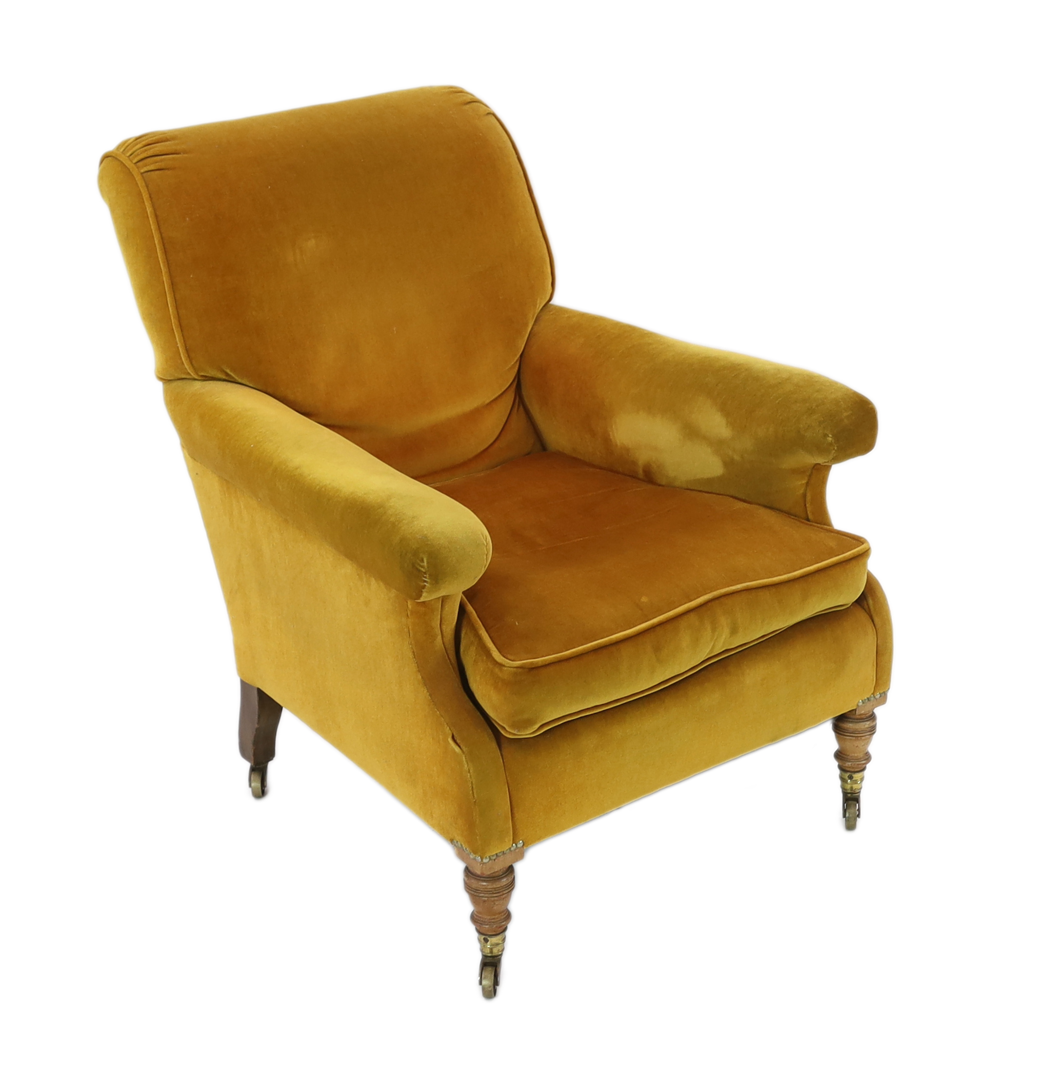 A late Victorian Howard & Sons upholstered armchair